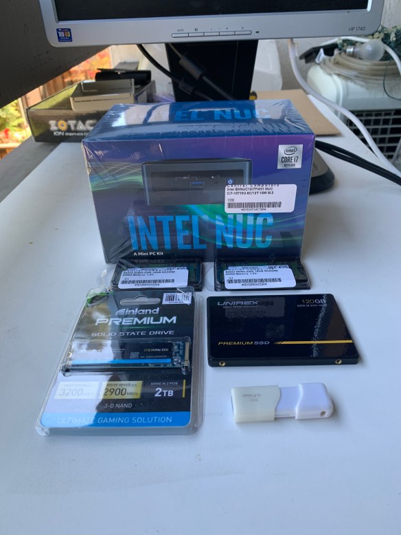 An Intel NUC NUC10i7FNH computer and the components to complete it