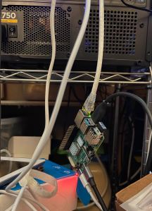 Raspberry Pi server hanging by the Ethernet cable